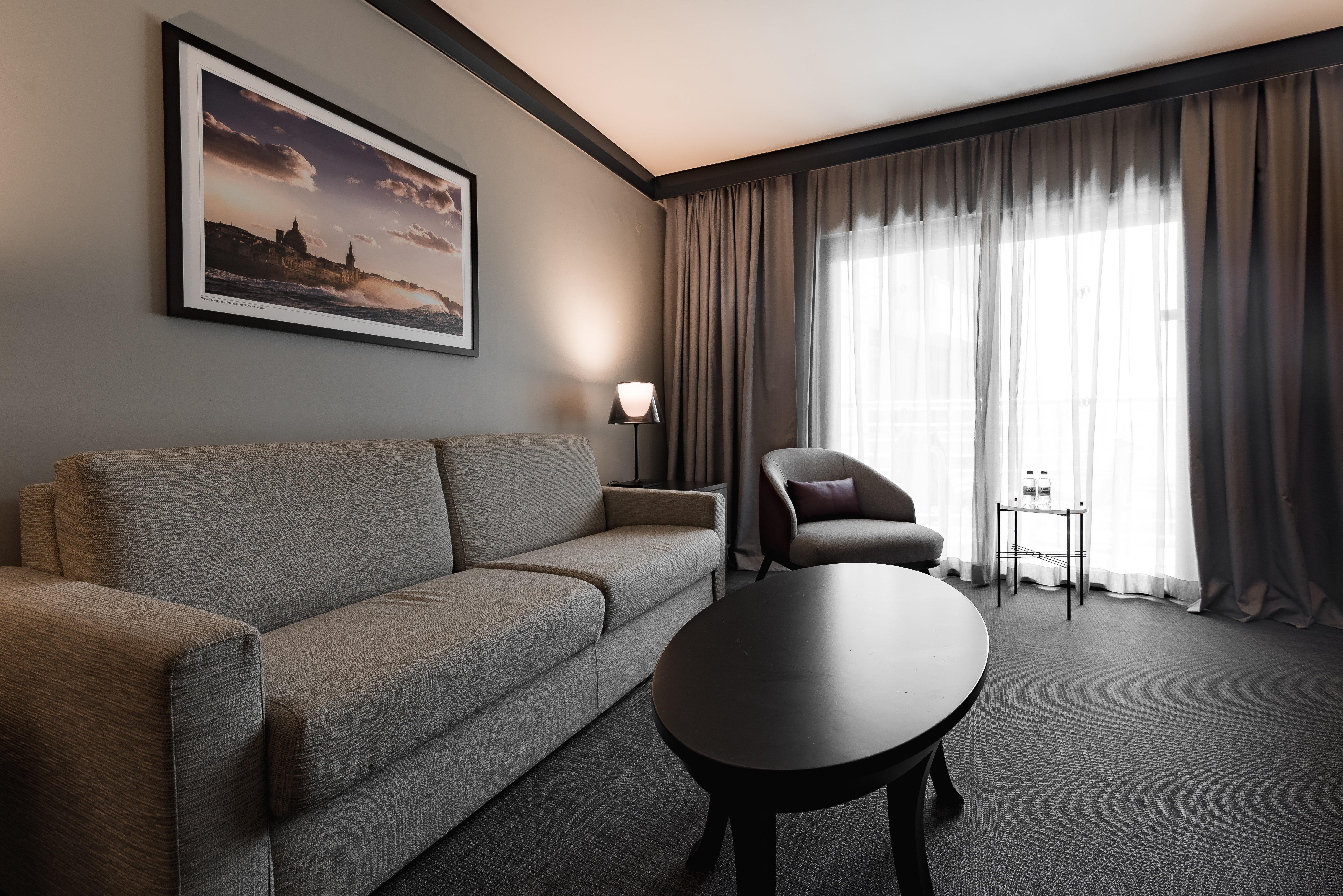 Intercontinental Malta By Ihg Hotel Saint Julian's Ngoại thất bức ảnh A 3D rendering of a living room